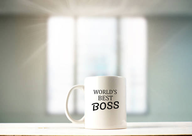 istock World's best boss text on coffee mug in coffeee 973754648