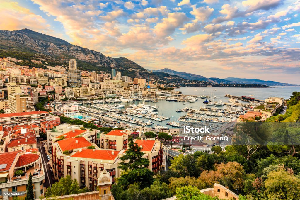 Monte Carlo marine with yachts and sail boats and town view at sunset. Monte Carlo. Monaco Monaco Stock Photo