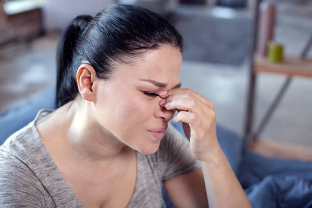 istock Jaded pretty woman experiencing dull ache 973766638