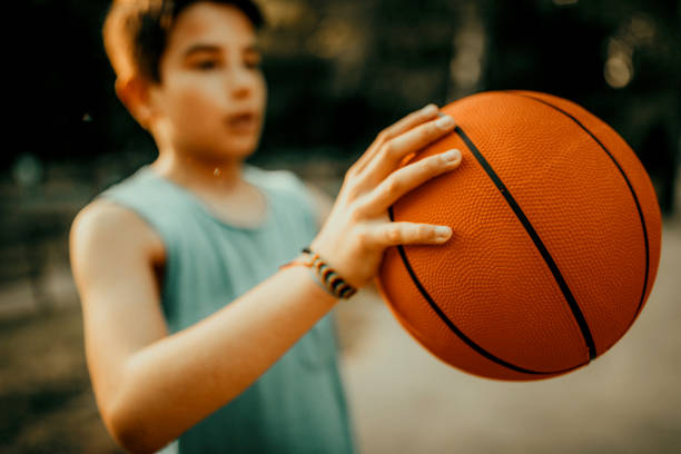 Basketball player holding ball