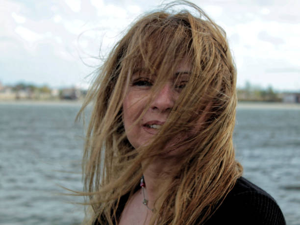 istock Smile and wind in her hair 973783498