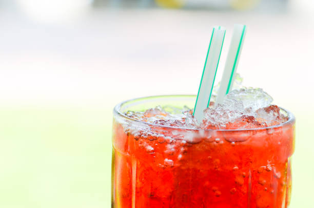 istock Red water and ice in a glass 973791396