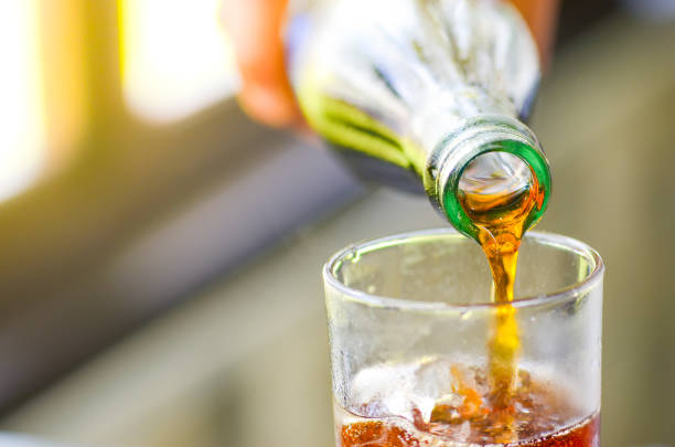 istock Cola drop in glass on holliday time 973791422