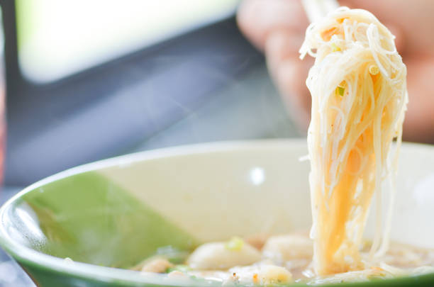 istock Delicious Thai noodle soup,spicy soup ,select focus 973791448