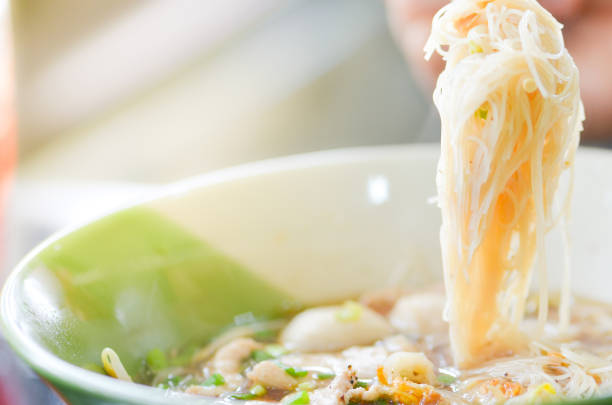 istock Delicious Thai noodle soup,spicy soup ,select focus 973791480