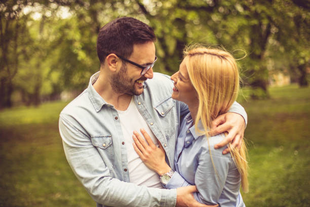 istock Lovely couple at park. 973796748