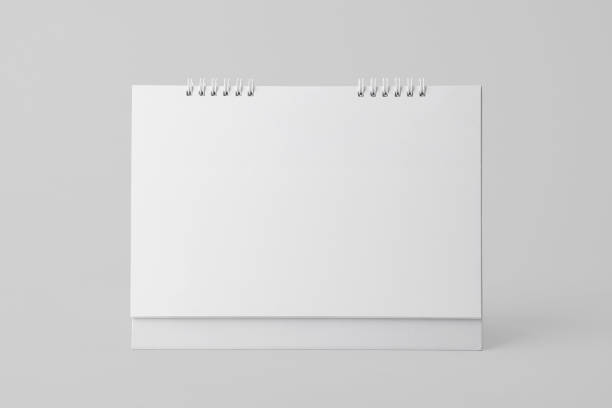 Blank paper spiral calendar for mockup template advertising and branding background. stock photo