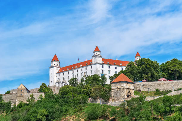 View of Bratislava castle Bratislava, Slovakia - May 24, 2018: View of Bratislava castle which occupies a prominent location in the city overlooking the Danube river. bratislava castle bratislava castle fort stock pictures, royalty-free photos & images