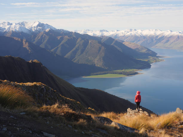 istock Young woman viewing mountain landscape 973833178