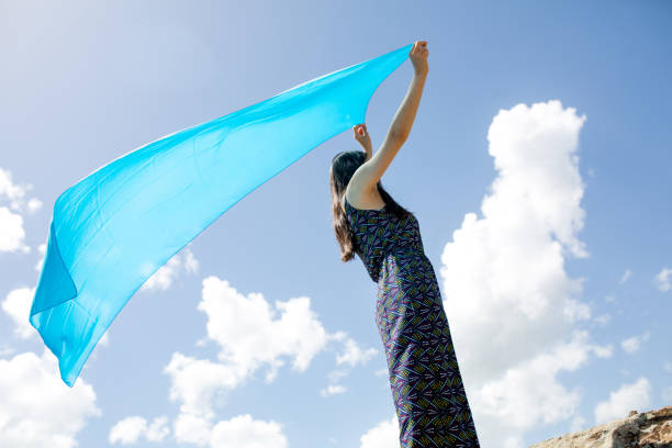 istock a young woman in the spring 973834346