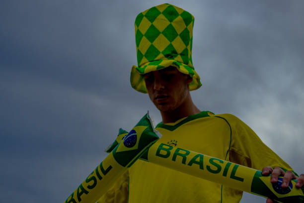istock Brazilian fan playing with baton 973836886