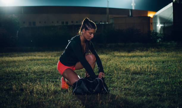 istock Sporty woman getting ready for training 973845260