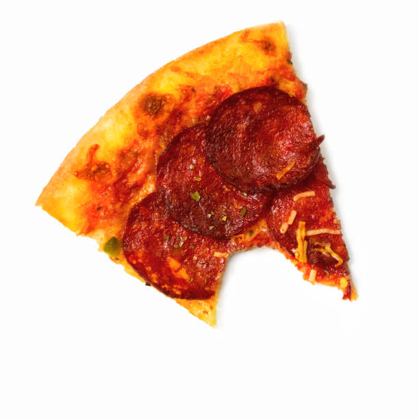 istock Eaten piece of pizza on white background 973848838