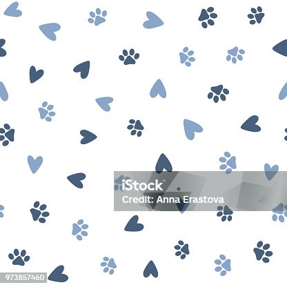 istock Repeated hearts and footprints of pets. Cute seamless pattern for animals. 973857460