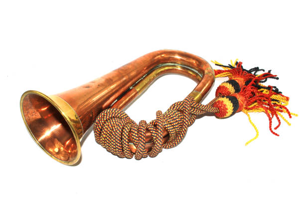 ein messing und kupfer kleine bugle instrument auf weißem hintergrund - brass instrument trumpet classical music flugelhorn stock-fotos und bilder