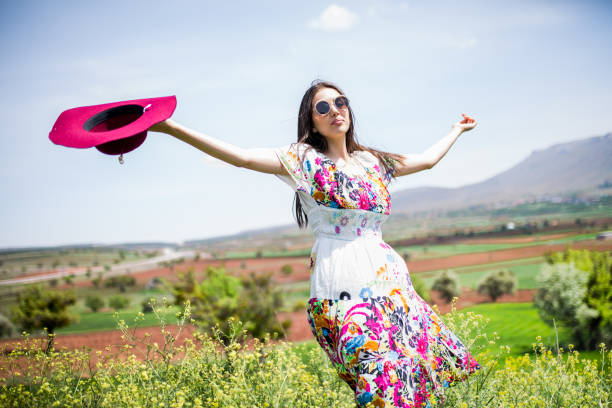 istock a young woman in the spring 973861302