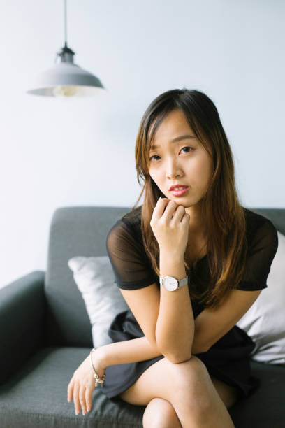 istock Young woman taking a break from online shopping. 973862264