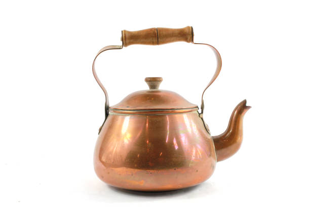 Vintage Antique Steam Punk Style Kettle Teapot on White Background stock photo