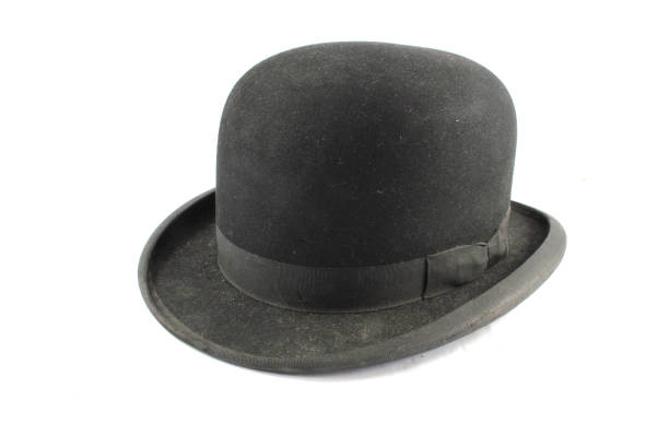 istock A Men's Bowler Hat Cap Old Fashioned on White Background 973882198