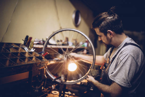 istock Repairman in work shop 973892264