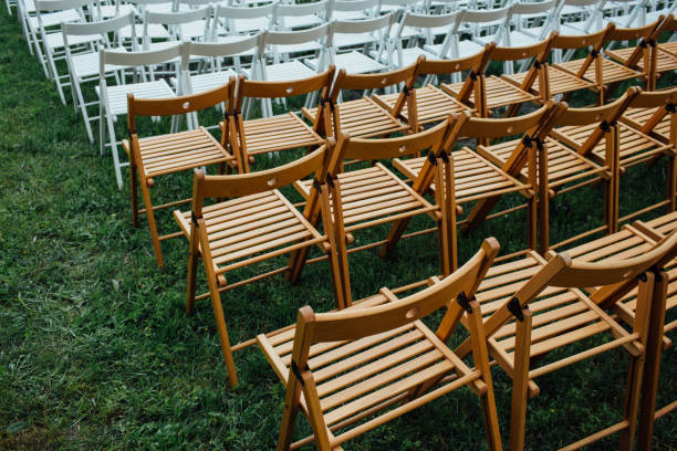 istock Wedding chairs in a park 973895182
