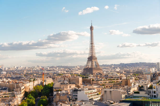 istock eiffel tour and Paris cityscape 973900442