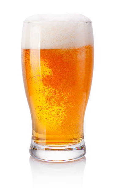 istock Glass of beer on white background 973902384