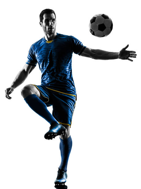 istock soccer player man silhouette isolated 973905320