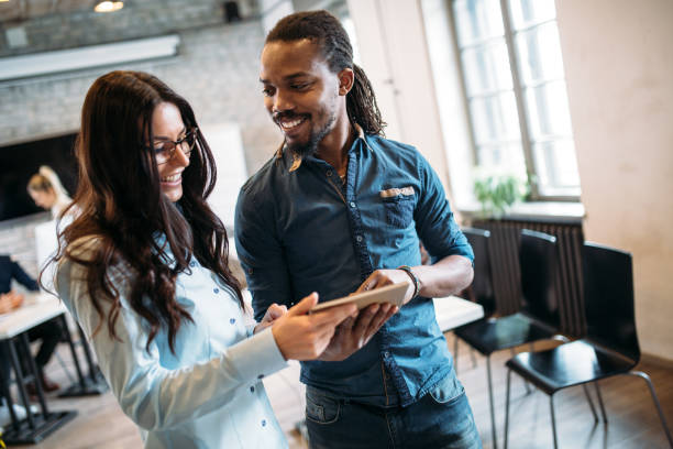 istock Portrait of architects having discussion in office 973905358