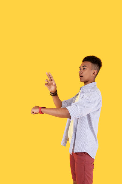 istock Smart young man looking in front of him 973905730