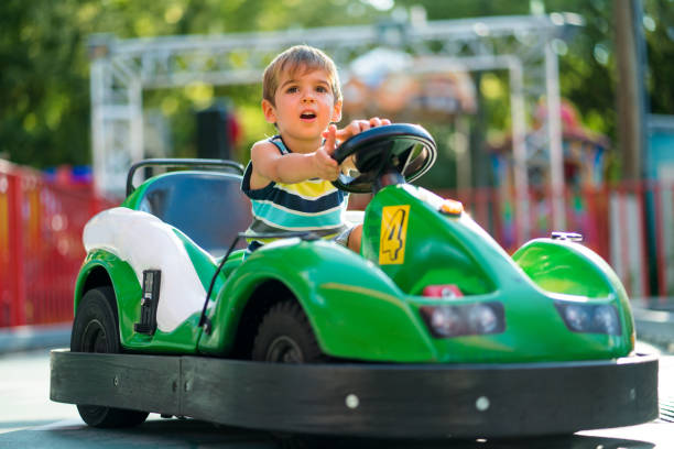 istock little boy in go cart 973906126