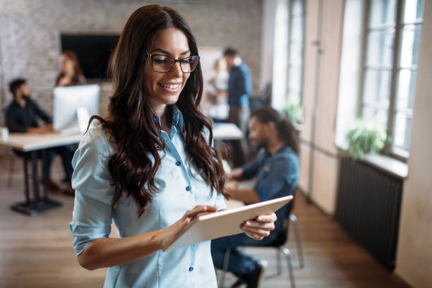 istock Young attractive architect working in modern office 973907094