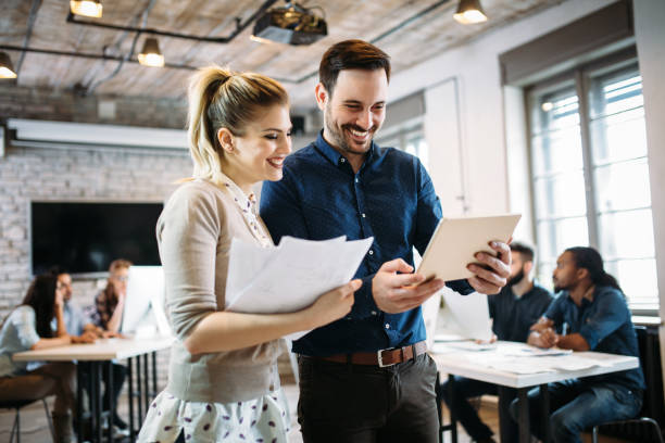 istock Portrait of architects having discussion in office 973909880