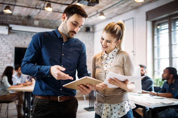 istock Portrait of architects having discussion in office 973910038