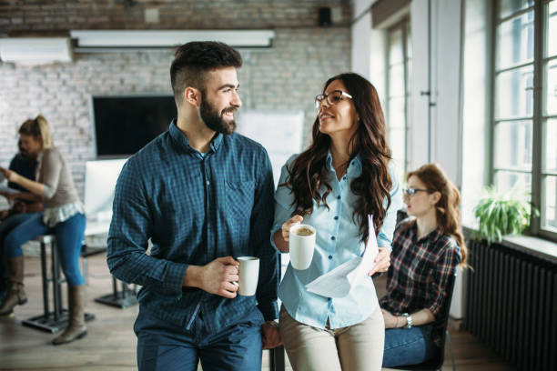 istock Portrait of architects having discussion in office 973910486