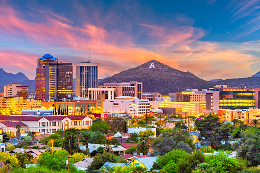 Tucson, Arizona, USA downtown skyline with Sentinel Peak at dusk. (Mountaintop 