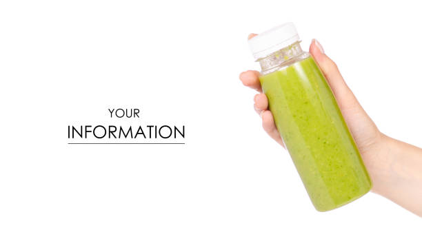 istock Bottle of smoothies green in hand pattern 973918828