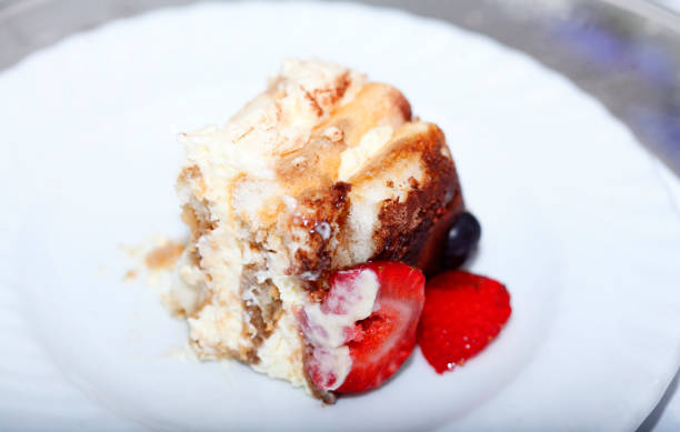 istock Tiramisu piece with fruit 973920822