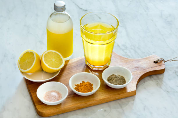 Detox and anti-inflammation healthy drink made from mineral water, organic apple cider vinegar, turmeric (kurkuma), pink Himalayan salt, ground black pepper and fleshly squeezed lemon. This is a great morning drink to vitalise and energise your body for the day, as well as a post-workout drink due to it's anti-inflammation qualities. It is also rich in vitamins and minerals which help lead a healthy and active life.