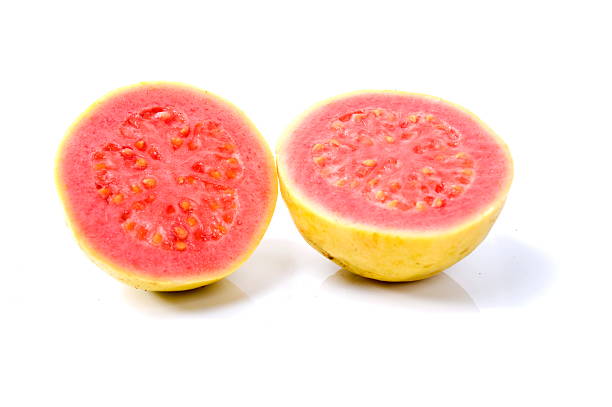 istock Pink guava cut in half showing seeds 97393563