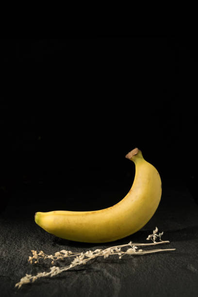 istock Banana against a dark background. 973939876