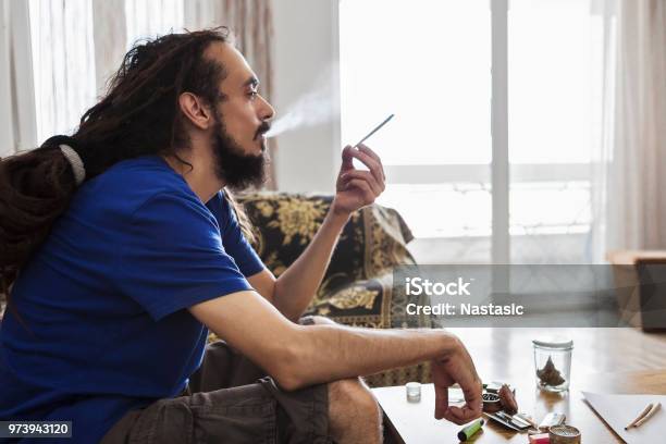 Men Smoking Marijuana Joint Stock Photo - Download Image Now - Smoking - Activity, Smoke - Physical Structure, Cannabis Plant