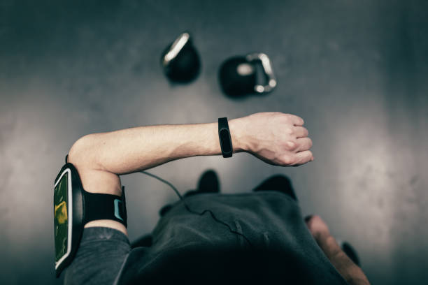 Personal perspective of man looking at smart watch