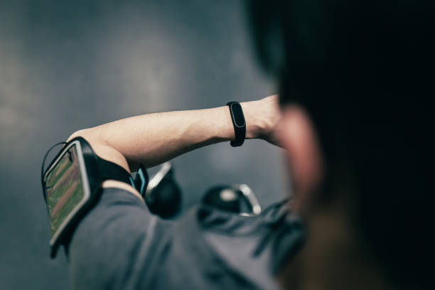 istock Personal perspective of man looking at smart watch 973947488