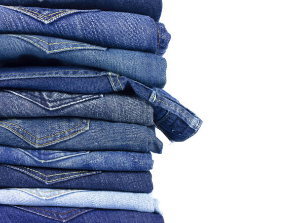 istock jeans denim isolated on white background. 973956658
