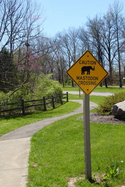 istock Warning Mastodon Crossing Sign 973959700