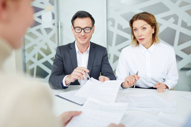 istock Adult colleagues having interview with candidate 973970898
