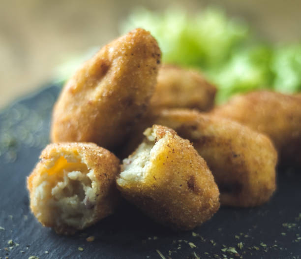 istock ham croquettes and cooked with vegetables in the background 973970998