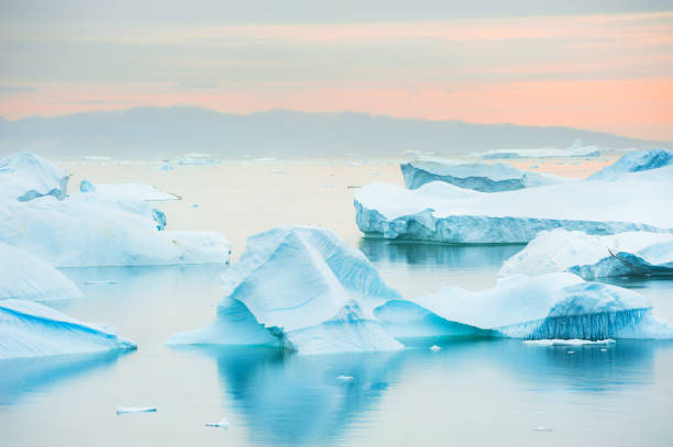 istock Blue icebergs in Atlantic ocean, Greenland 973974208