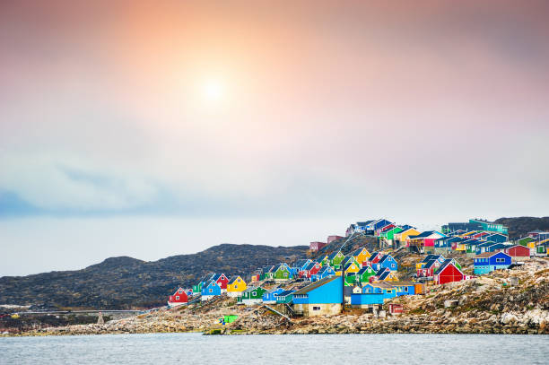 Colorful houses in Aasiaat village, Greenland Colorful houses in Aasiaat village, western Greenland greenland stock pictures, royalty-free photos & images